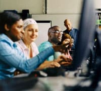 information tech students at computer